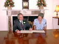 Thumbnail of Signing the register.jpg