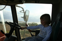 Thumbnail of Emma driving combine.jpg