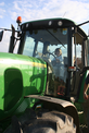 Emma driving tractor